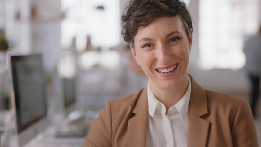 Portrait beautiful business woman smiling happy entrepreneur enjoying successful startup company proud manager in office workspace | Shutterstock HD Video #1024999181