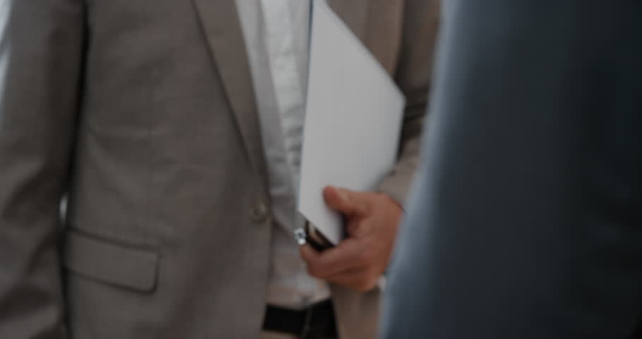 close up business people shaking hands corporate partnership deal welcoming opportunity for cooperation in office Royalty-Free Stock Footage #1024999853
