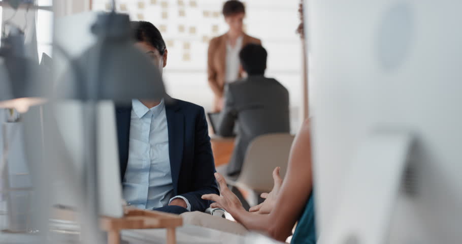young indian business woman chatting to intern discussing job interview colleagues having conversation in office enjoying teamwork Royalty-Free Stock Footage #1025001470