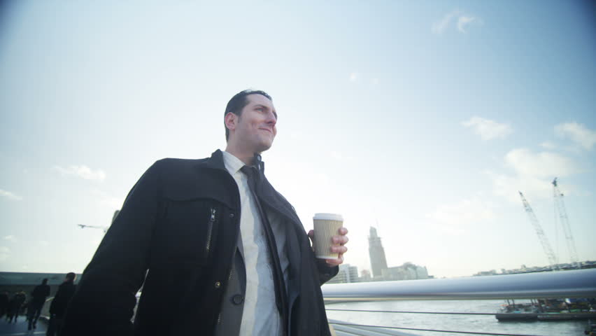 4K Cheerful attractive Businessmen meet and shake hands outdoors in the city