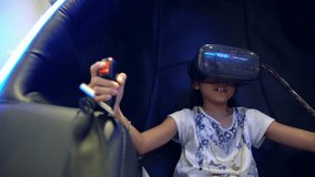 Kid playing with virtual reality glasses 