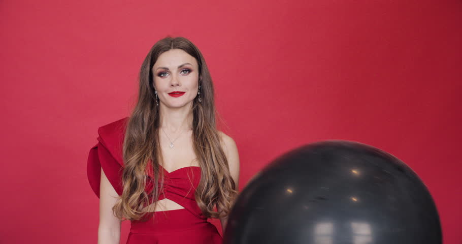 Stunning lady in red with air balloon says hello 30.