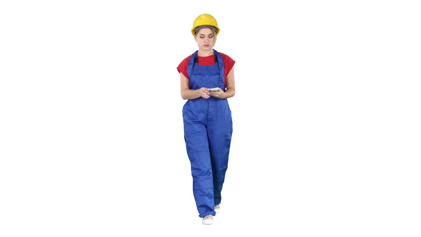Female constuction worker counting money while walking on white background.