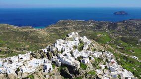 Aerial drone video of picturesque main village or hora of Serifos island with breathtaking views to the Aegean sea in spring, Cyclades islands, Greece