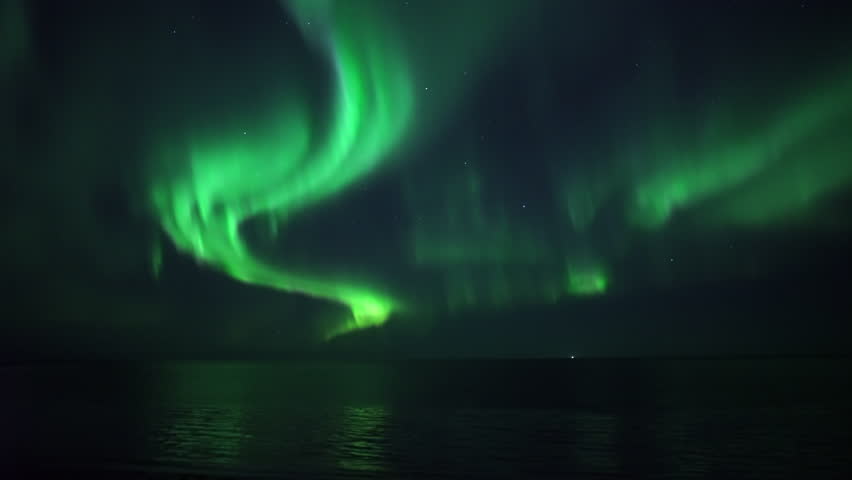 Brilliant real time Aurora Borealis reflecting in ocean real time video Grotta Iceland.mov
 Royalty-Free Stock Footage #1025031980