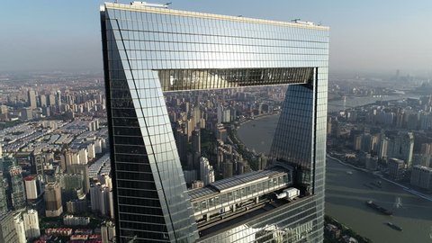 SHANGHAI, CHINA - SEPTEMBER 2018: Drone shot of Shanghai World Financial Center, modern architectural design in financial business district in Pudong, China