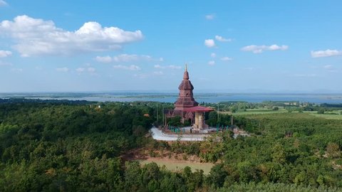 Amazing Thailand PHRA BUDDHA SAIYAT PHUKHAO Wat Putthanimit Pagoda , Wat Phu Khao Temple in Kalasin, Thailand.