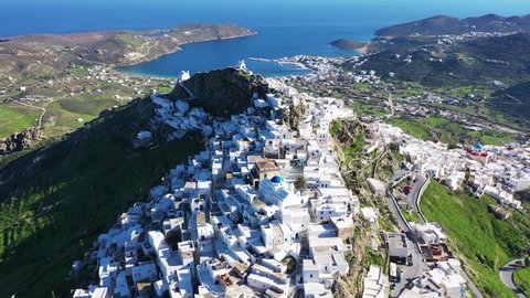 Aerial drone panoramic video of picturesque main village or chora of Serifos island with breathtaking views to the Aegean sea in spring, Cyclades islands, Greece
