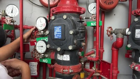 Kuala Lumpur, Malaysia. January 23, 2019. Fire protection system servicing for FM global result. The meter indicates the pressure has entered the sprikler system as well as functioning.
