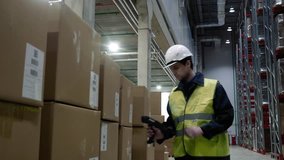 Barcode scanner in modern warehouse and scanning code on cardboard box - Powered by Shutterstock - Get 15% off with code: PIKWIZARD15
