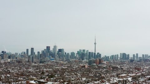 4K Aerial Establishing shot of a Toronto neighborhood during the winter. Cinematic shot.