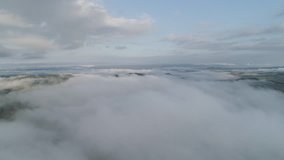 Dropping down into an amazing thick low level sea of clouds in Chiang Rai Northern Thailand