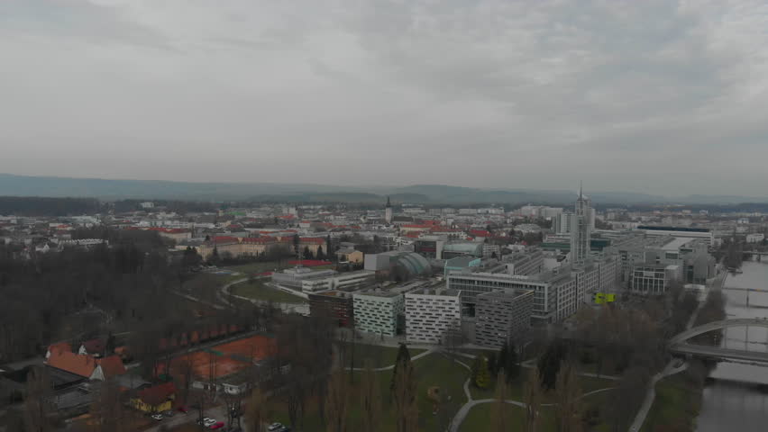 Drone shot over looking the city of Sankt Pölten, in Austria. The drone is forward to the city
