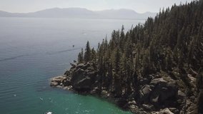 Drone shot of the pines and mountainscape of Lake Tahoe