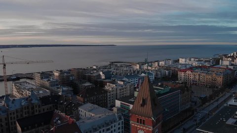 Helsingborg, Helsingborg / Sweden - 01 03 2019: Aerial view of central Helsingborg at sunset. Backing away from rådhuset