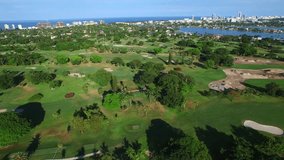 Aerial flyover of a golf course 4k uhd