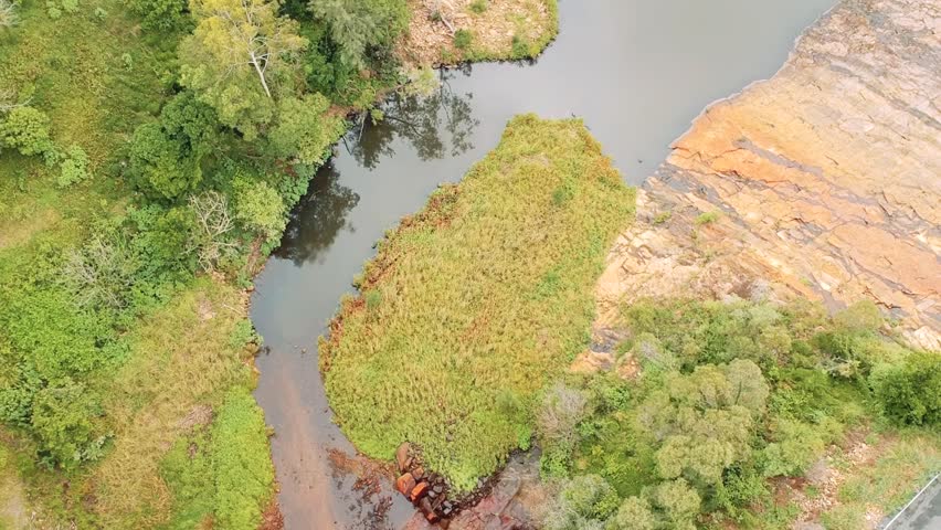 Aerial footage of creek and Dam
