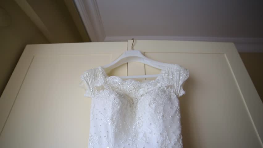Bride Dress Hung On The Wardrobe Before The Wedding. Fish Eye Footage