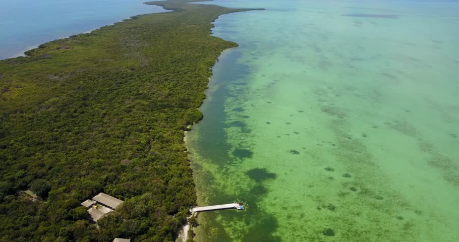 AERIAL: slowly pushing down the shoreline of Elliot Key, Florida.
