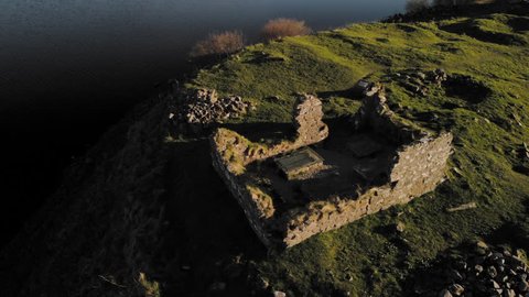 Aerial Drone Flight over Finlaggan, an historic site on Eilean Mòr in Loch Finlaggan.