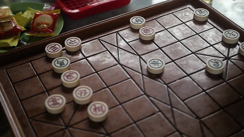 Tra vinh, Vietnam - 10 30 2018: elderly males playing Chinese chess, Vietnam