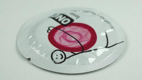 Melaka, Malaysia - Circa March, 2019: Condoms birth control contraception closeup, loop. Conceptual. One Condom brand Malaysia