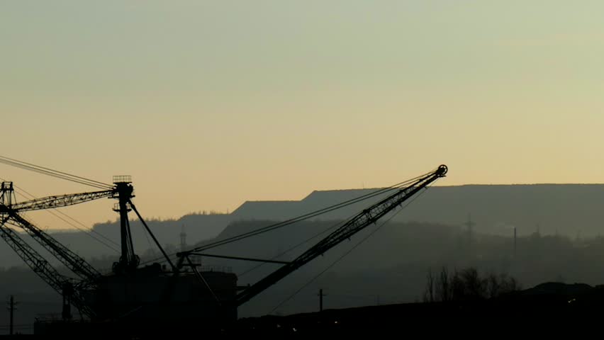 The work of heavy machinery. Mining of iron ore