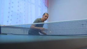 table tennis forehand concept. slow motion video. blurred focus man playing training table tennis lifestyle the sport active