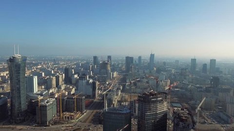 Aerial view of the skyscrapers of Warsaw. 01. March. 2019. Construction of a modern skyscraper.