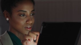 beautiful business woman using tablet computer working late in office browsing information looking at data on digital touchscreen - Powered by Shutterstock - Get 15% off with code: PIKWIZARD15