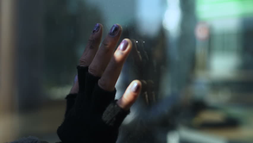 Female bum hand on restaurant window glass, poor segment of population, problem | Shutterstock HD Video #1025164967