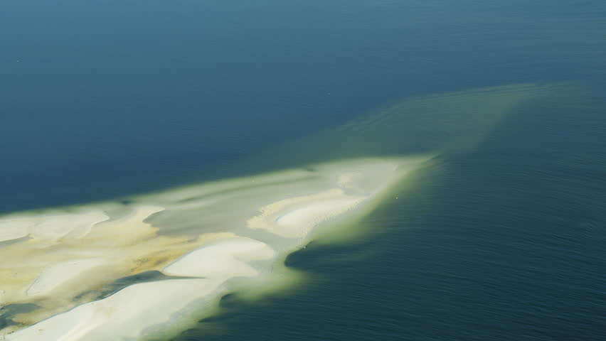 Aerial view of white sands on ocean reef green turquoise waters Gulf of Mexico America RED WEAPON