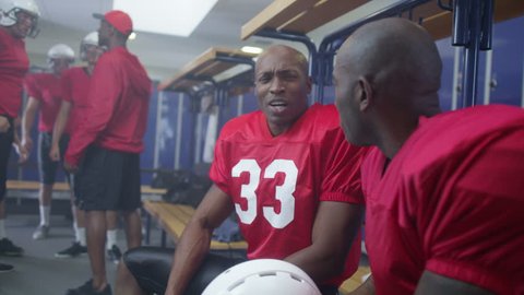 4k American Football Players Team Locker Stock Footage Video (100%