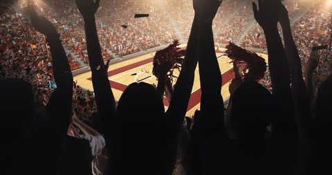 Fans clapping hands to cheer their favorite basketball team on the stands of the professional stadium. Stadium is made in 3D and animated.