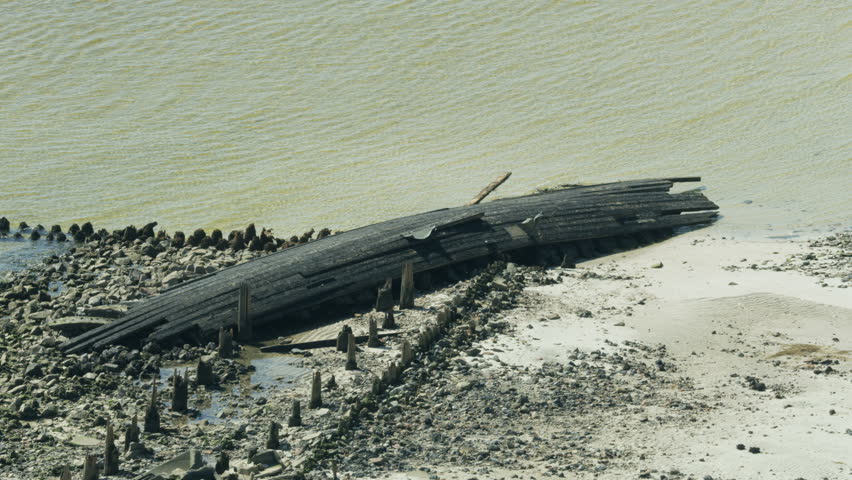 Aerial view wrecked ship washed ashore on Dog Island in 1899 Carrabelle Hurricane and unearthed by Hurricane Michael in 2018 Florida America RED WEAPON