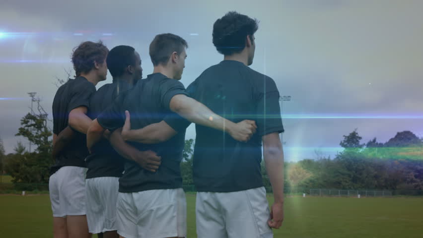 Digital composite of rugby players holding each others against network connection lines background