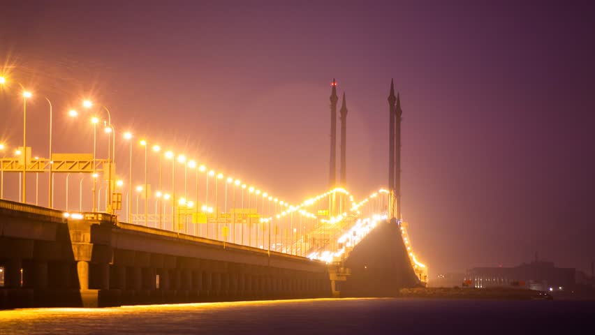 4K timelapse of busy traffic in Penang Bridge during sunrise
