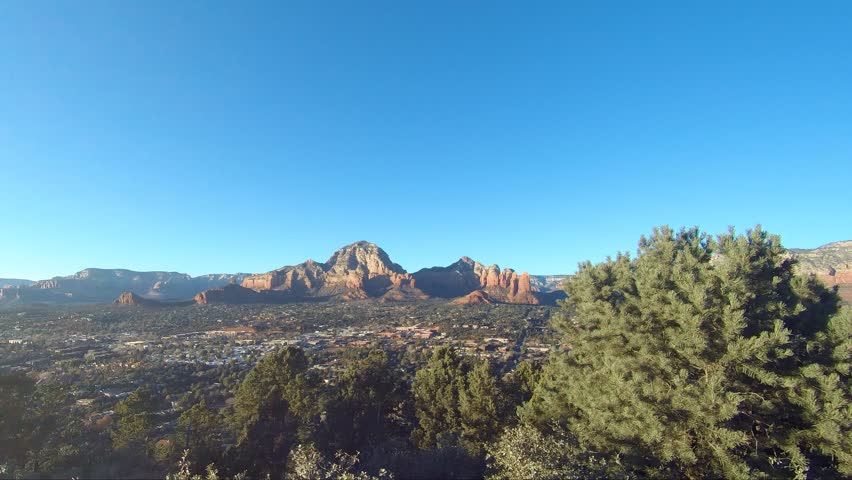 Aerial sunset to night timelapse of the Capitol Butte mountain and Sedona