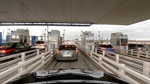 NORMANDY, FRANCE - MARCH 03 2018: Car passing the toll point Sandouville Normandy.