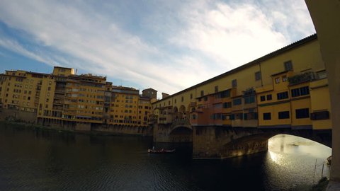 Florence, Italy - 09 12 2018: Ponte Vecchio, Florence gondola boat 