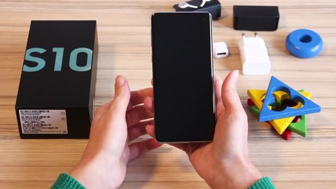 Unboxing Samsung Galaxy S10 - Showing Both Sides of the Cellphone and Removing the Tape From the Back Screen (06 March 2019, Nis, Serbia)