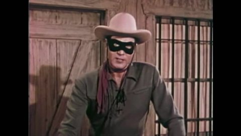 CIRCA 1958 - Dressed as the Lone Ranger, actor Clayton Moore promotes the Peace Patrol Savings and Bonds program.