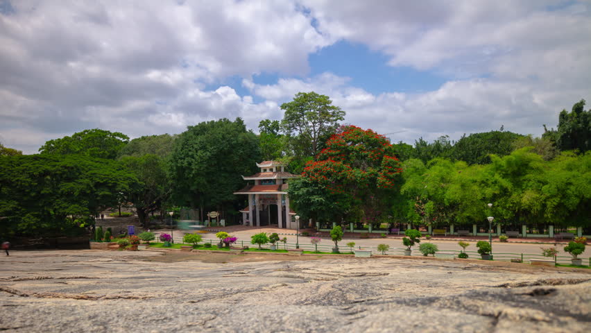 sunny bangalore city famous lalbagh botanical garden stone panorama 4k timelapse india