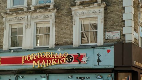 LONDON, circa 2019 - Close-up panning shot of an Antiques Shop in Portobello Road, Notting Hill, London, UK, home to the famous Portobello Road Market