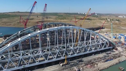Construction of the Crimean bridge. The process of building a bridge. Assembling spans and arches of the bridge.