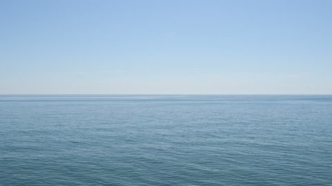 Blue calm sea with little waves in the morning