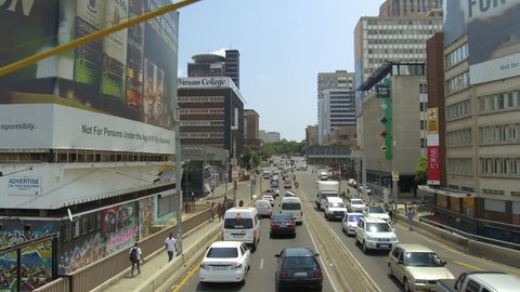 Johannesburg, South Africa, 7th February - 2019: Driving through city centre with skyscrapers and office buildings.