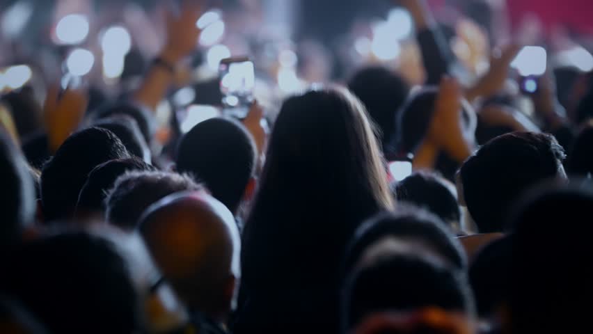Popular Crowd singing artist cheering 4k rock pop music slow music rap music scene shows Concert crowd applause concert stage 4k concert hall neon Flood led nights club jumping hall waving silhouettes Royalty-Free Stock Footage #1025329781