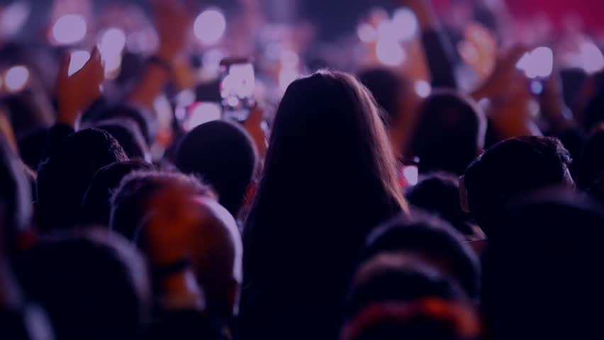 Popular Crowd singing artist cheering 4k rock pop music slow music rap music scene shows Concert crowd applause concert stage 4k concert hall neon Flood led nights club jumping hall waving silhouettes Royalty-Free Stock Footage #1025329796
