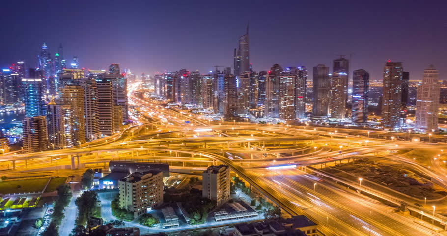 Aerial Of Urban Highway At Night Cars Lights Moving Junction Overpass City Panorama Dubai Business District Low Light Uhd Hdr 4k | Shutterstock HD Video #1025330426